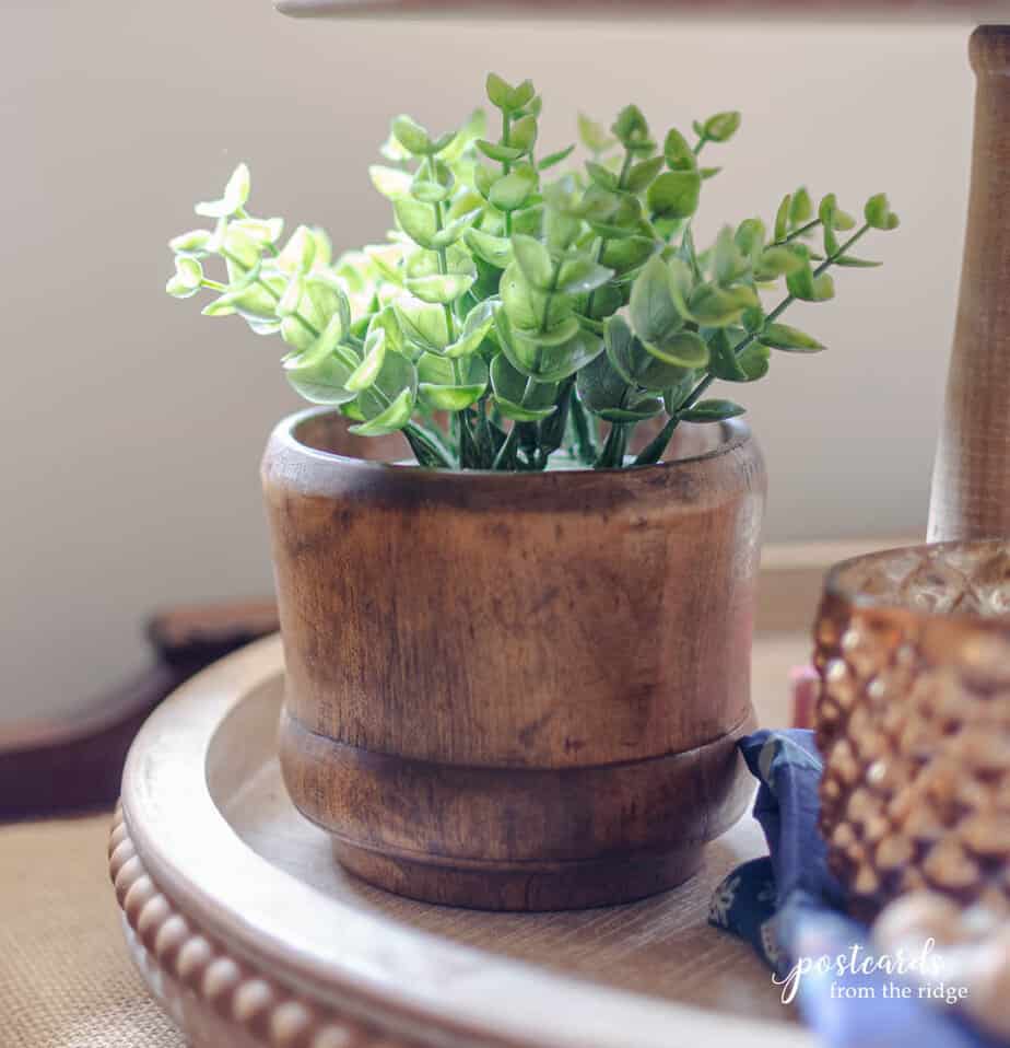 artificial plant in wooden planter for Thanksgiving tiered tray