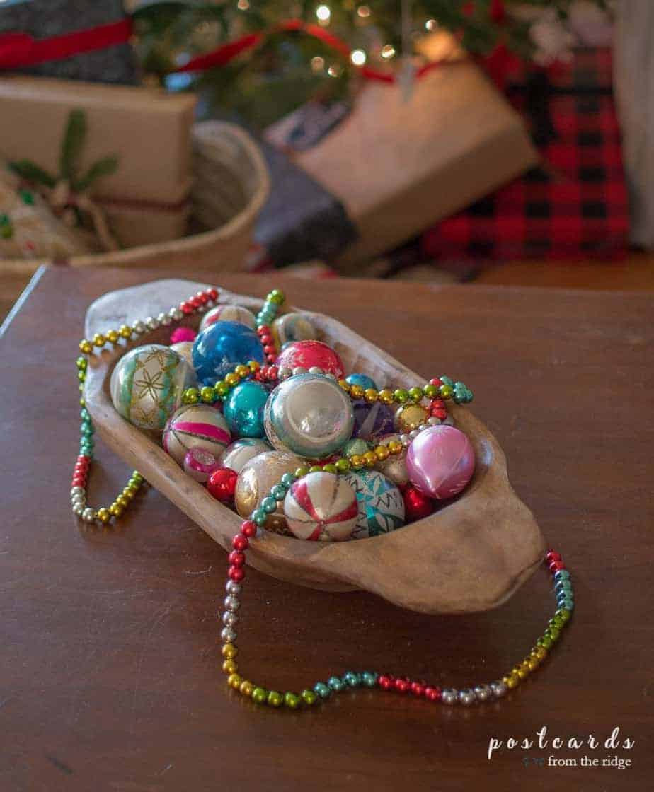 wooden dough bowl with vintage shiny brite Christmas ornaments