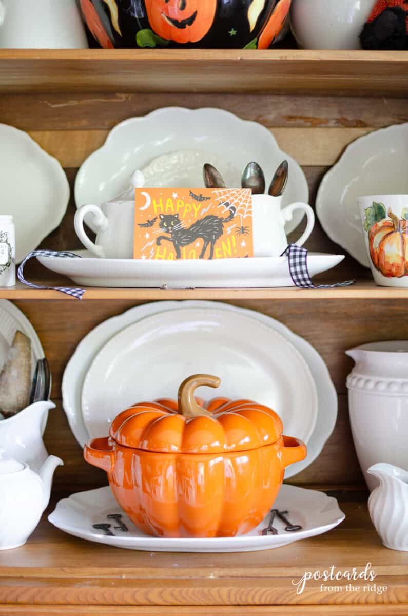 vintage white platters with Halloween decor