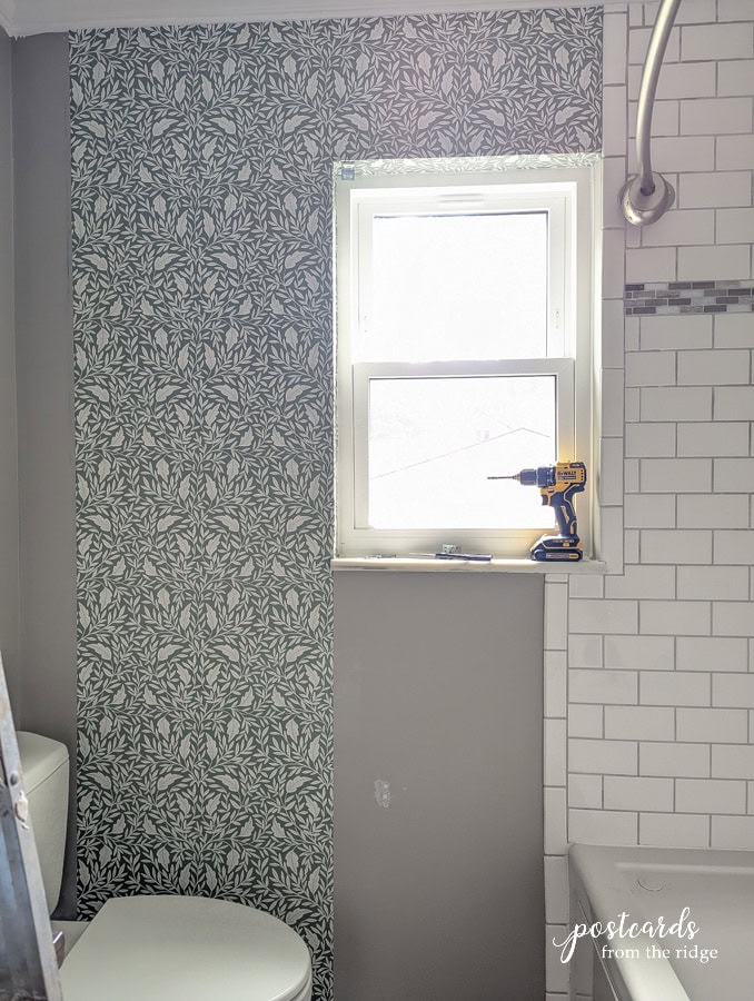 wallpaper installation in a bathroom