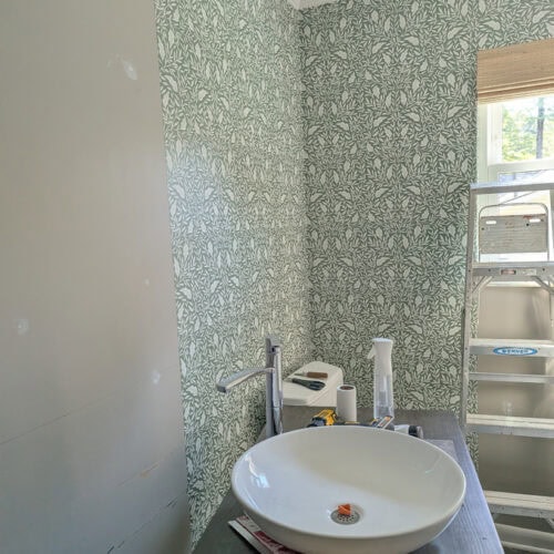 installing green and white leafy wallpaper from Love vs Design