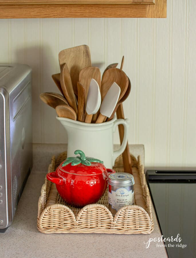 wooden spoons in vintage white ironstone pitcher